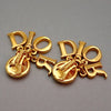 Authentic Vintage Christian Dior clip on earrings logo rhinestone dangle