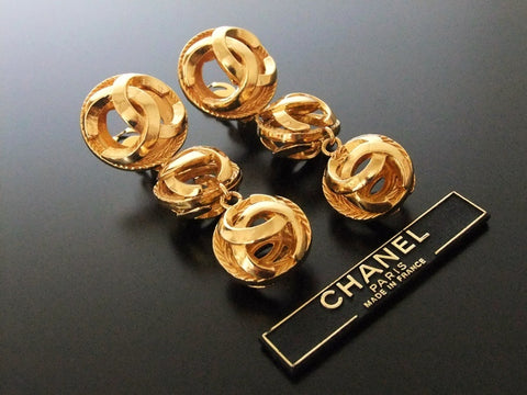 Authentic Vintage Chanel earrings swing gold triple CC ball