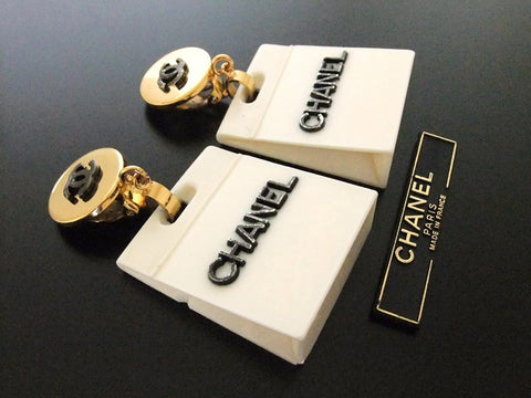 Authentic vintage Chanel earrings black CC logo swing white bag rare