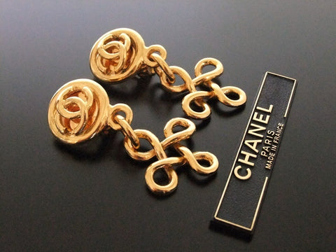 Authentic vintage Chanel earrings gold CC swing dangle large