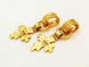 Authentic vintage Chanel earrings swing gold cc logo cross dangle