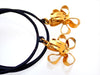 Authentic vintage Chanel earrings CC logo flower black hoop dangle
