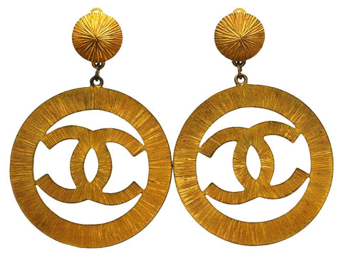 Vintage Chanel earrings sunburst CC logo dangle