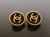 Authentic vintage Chanel earrings gold CC black button round