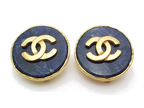 Authentic vintage Chanel earrings gold CC navy blue stone round