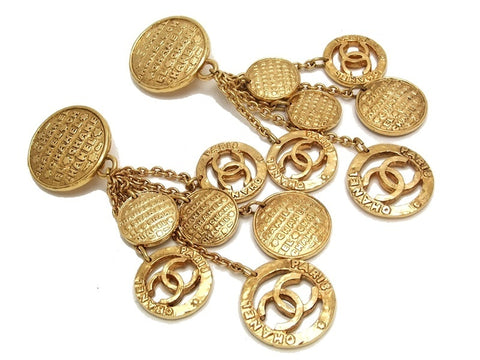 Authentic vintage Chanel earrings gold swing CC medals huge rare