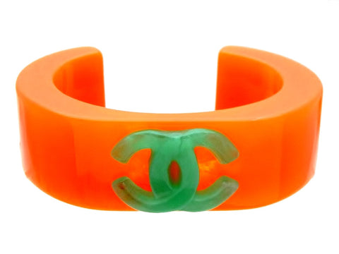 Vintage Chanel cuff bracelet green CC logo orange plastic