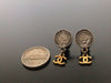 Authentic vintage Chanel earrings COCO medal swing gold CC