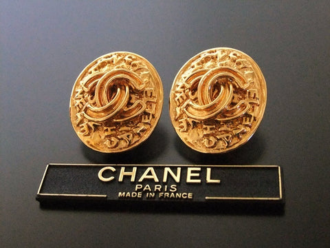 Authentic vintage Chanel earrings gold CC logo round