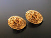 Authentic vintage Chanel earrings gold CC logo round