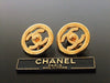 Authentic vintage Chanel earrings gold turnlock CC round