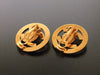 Authentic vintage Chanel earrings gold turnlock CC round