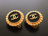 Authentic vintage Chanel earrings gold CC black round