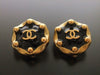 Authentic vintage Chanel earrings gold CC black round