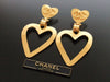 Authentic vintage Chanel earrings gold CC swing heart hoop dangle