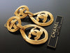 Authentic vintage Chanel earrings swing gold CC hoop dangle