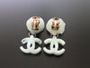 Authentic vintage Chanel earrings camellia swing CC white green