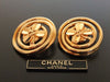 Authentic vintage Chanel earrings gold CC clover round