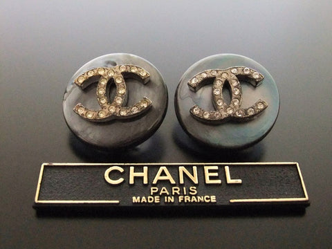 Authentic vintage Chanel earrings rhinestone CC aurora round