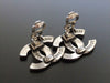 Authentic vintage Chanel earrings silver logo CC