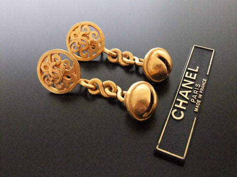 Authentic vintage Chanel earrings gold CC swing bell dangle