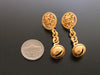 Authentic vintage Chanel earrings gold CC swing bell dangle