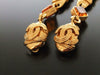 Authentic vintage Chanel earrings gold CC swing gripoix glass huge