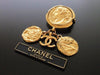 Authentic vintage Chanel pin brooch gold swing CC horse medal dangle