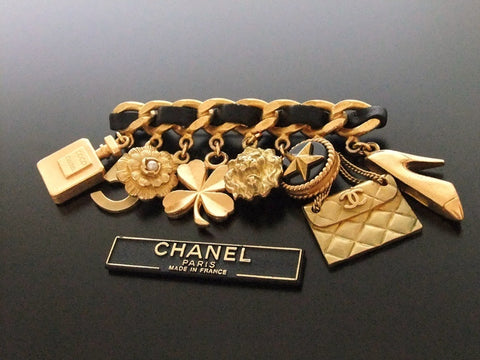 Authentic vintage Chanel pin brooch gold CC 8 icon charms rare