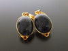 Authentic vintage Chanel earrings navy blue stone gold swing CC