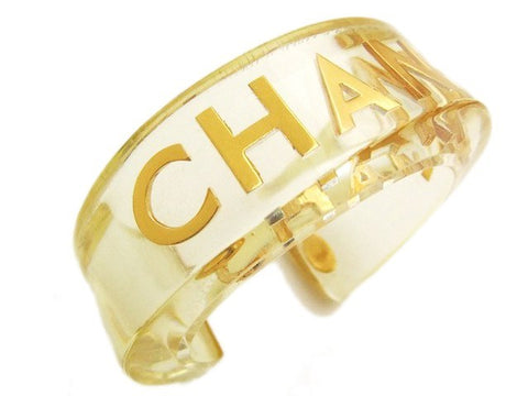 Authentic Vintage Chanel cuff bracelet bangle gold logo clear color