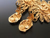 Authentic vintage Chanel earrings gold swing CC dangle huge sun