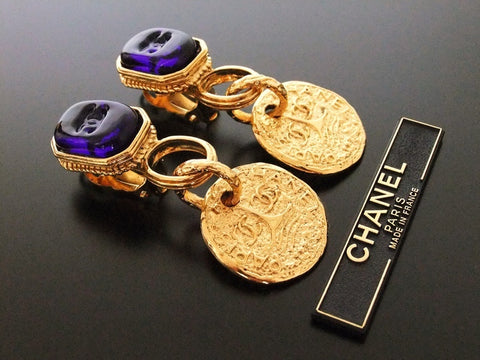Authentic vintage Chanel earrings navy blue glass swing CC medal
