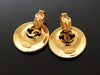 Authentic vintage Chanel earrings gold swing disc CC dangle large