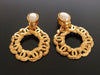 Authentic vintage Chanel earrings pearl swing gold CC hoop dangle