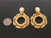 Authentic vintage Chanel earrings pearl swing gold CC hoop dangle