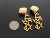 Authentic vintage Chanel earrings gold swing logo dangle huge
