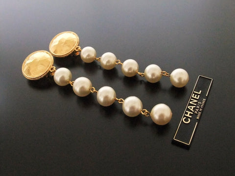 Authentic vintage Chanel earrings 5 swing pearls dangle long