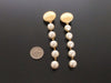 Authentic vintage Chanel earrings 5 swing pearls dangle long