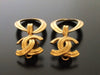 Authentic vintage Chanel earrings gold CC swing hoop large