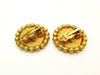 Authentic vintage Chanel earrings black CC gold round classic clip on