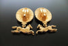 Authentic vintage Chanel earrings gold CC swing horse
