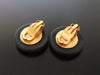 Authentic vintage Chanel earrings white logo black round