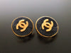 Authentic vintage Chanel earrings gold CC navy blue stone round