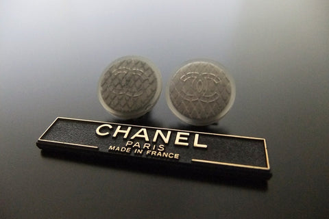 Authentic vintage Chanel earrings CC rubber