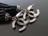 Authentic vintage Chanel earrings CC black beads fringe tassel dangle