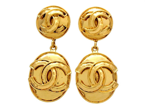 Vintage Chanel dangling earrings CC logo round