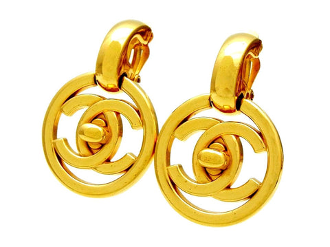 Vintage Chanel earrings turnlock CC logo round dangle
