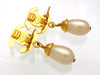 Vintage Chanel earrings turnlock CC logo pearl dangle