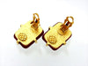 Vintage Chanel earrings CC logo red glass stone